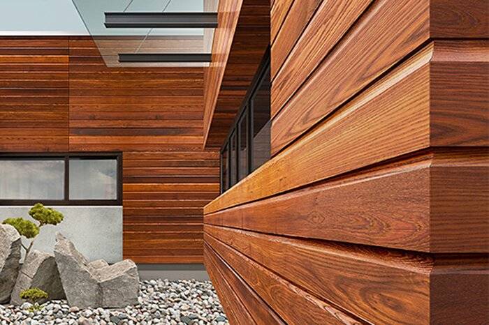 Фасад из планкена - способ придать дому уникальность облика