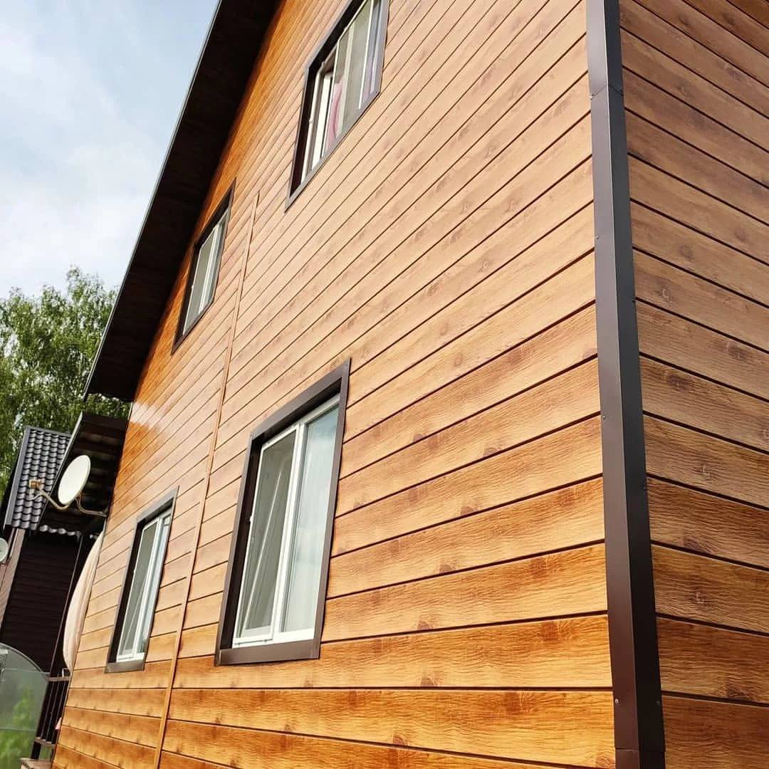 Какой сайдинг лучше для деревянного дома: виниловый или акриловый