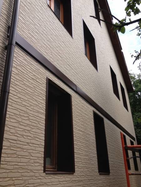Фиброцементные панели для отделки фасада дома
