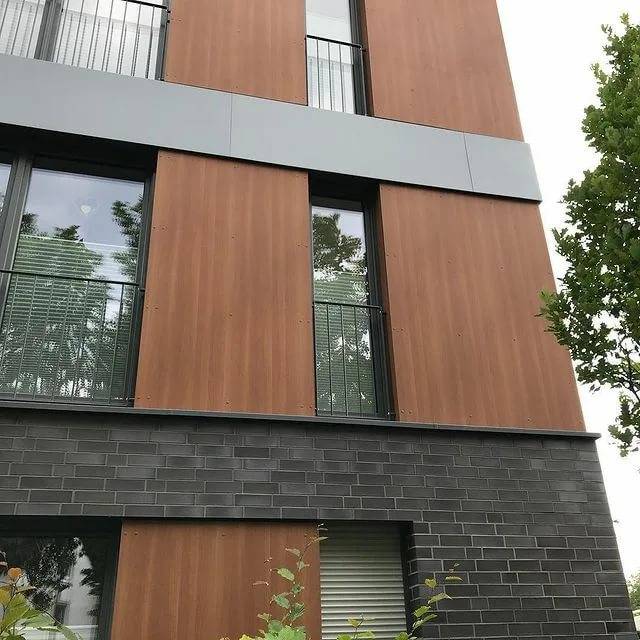 Ламинированные hpl панели для обшивки фасадов промышленных и жилых зданий
