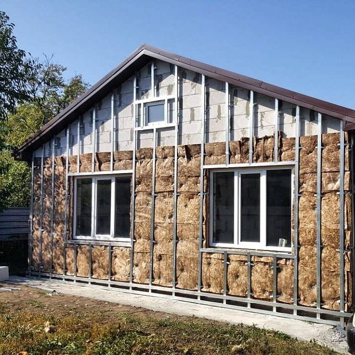 Утепление фасада деревянного дома снаружи – выбор материалов