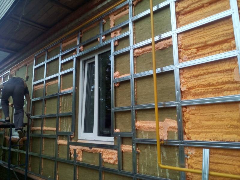 Фиброцементные панели для наружной отделки фасада дома