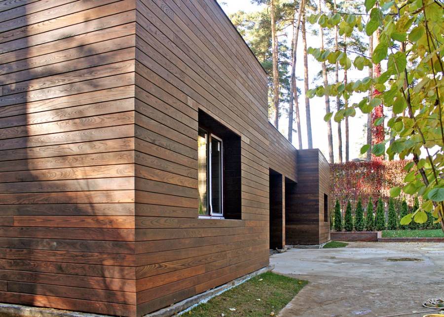 Чем отделать фасад деревянного дома: выбор материала