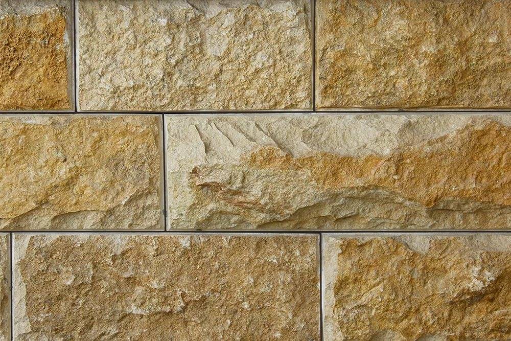 Фасад из песчаника — технология облицовки песчаником, способы и особенности