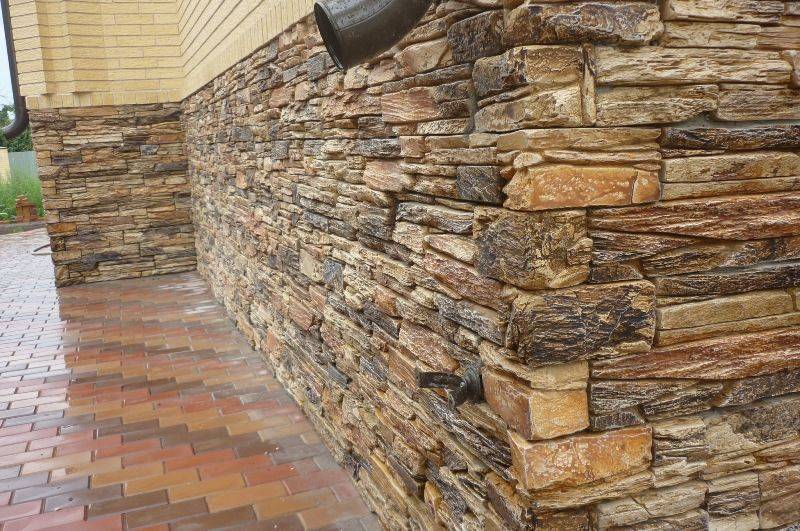Облицовка фасада натуральным камнем: технология отделки дома природным материалом (фото, видео)