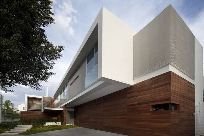 Дома в современном стиле: фасады из облицовочного кирпича разного цвета, красивый дизайн
 - 47 фото